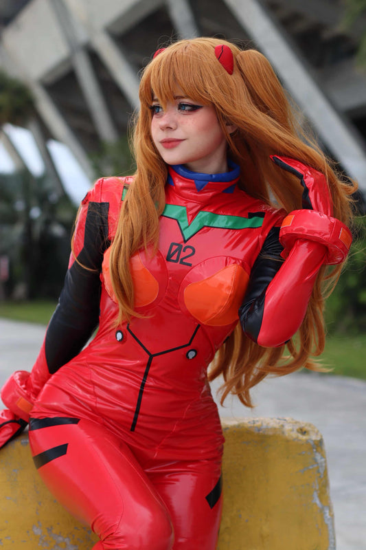 Action pose of cosplayer in Asuka Langley Soryu red plugsuit with tactical gloves