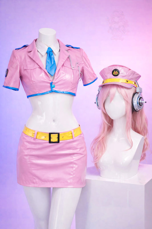 Cosplay outfit with pink jacket and skirt on a mannequin, accompanied by a wig and headphones on a separate mannequin head.
