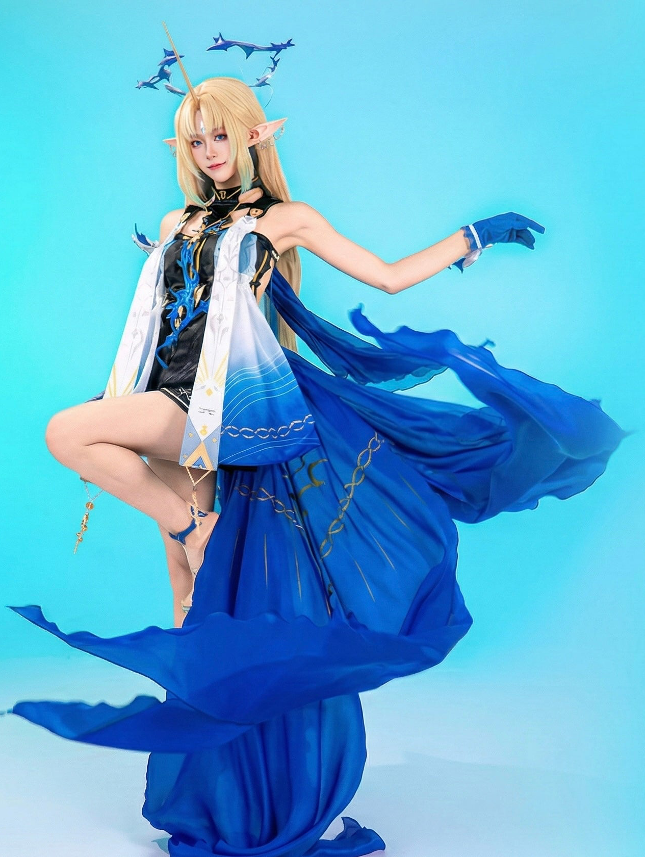 Ethereal Cartethyia Shorekeeper cosplay from Wuthering Waves featuring blue butterfly gown and star halo.