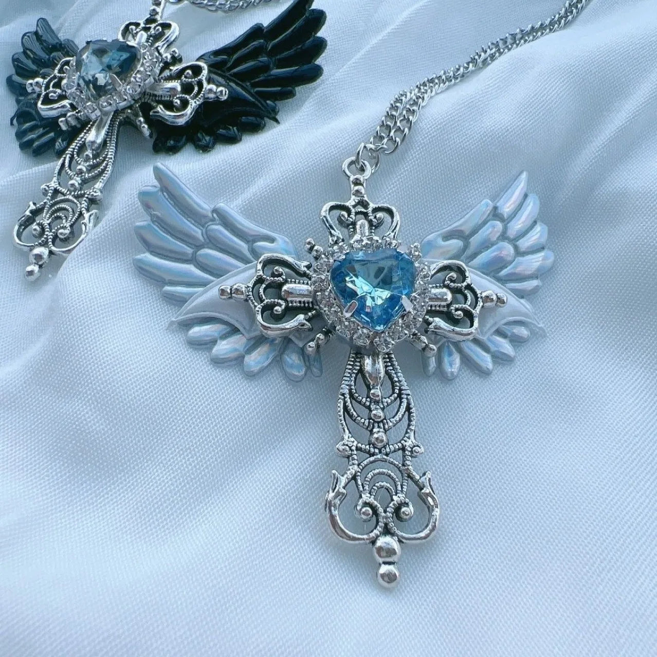 Nocturne Winged Cross Necklace