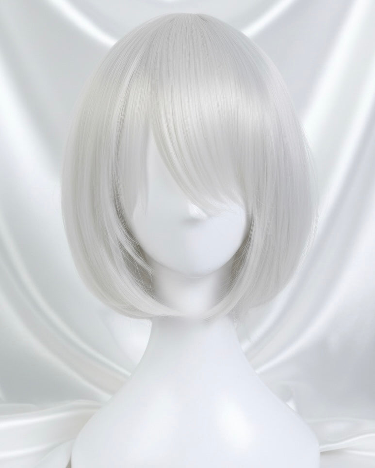A close-up of a high-quality white synthetic cosplay wig styled in a short, sleek bob with side-swept bangs, designed for the character 2B from Nier Automata.