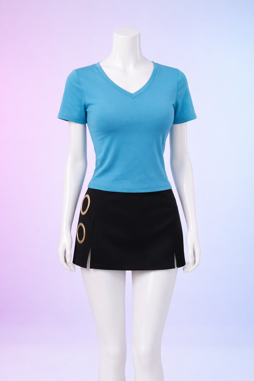 Mannequin wearing a blue top and black skirt with gold accents on a gradient background