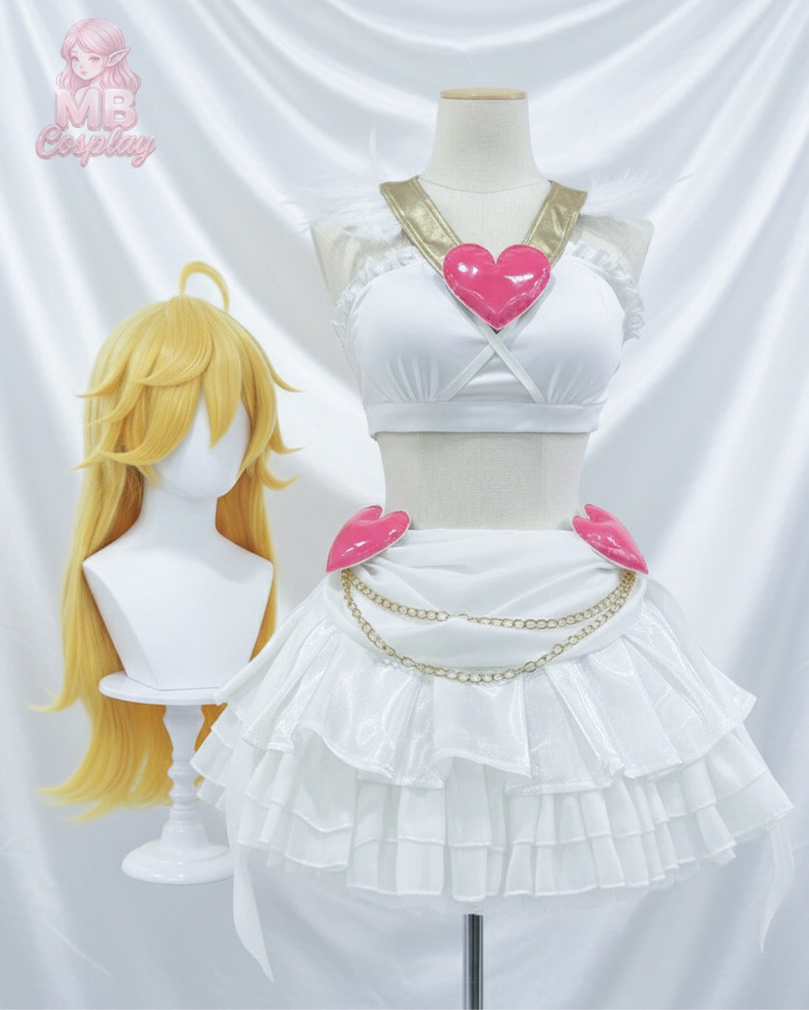 Front view of the Panty Anarchy Angel cosplay on a mannequin featuring the signature gold "V" neck collar, pink heart, tiered frill skirt with gold chains, and the iconic long blonde wig with a cowlick.