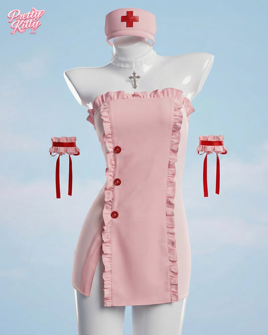 Front view of the pink Healing Heart nurse cosplay set featuring ruffles and red cross accents