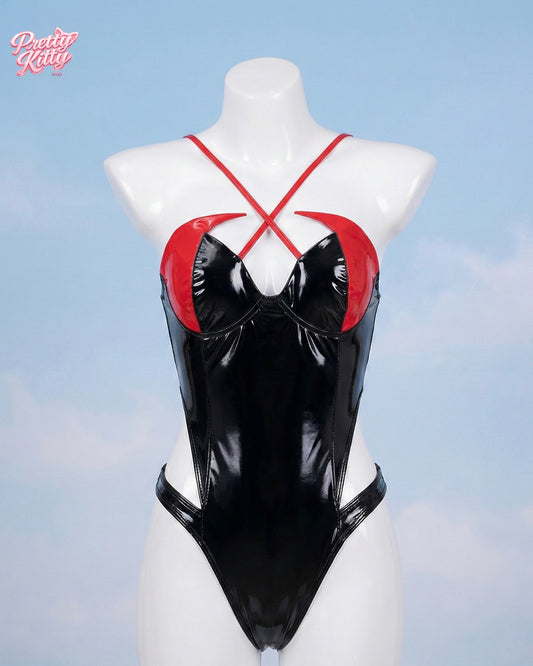 Front view of the high-gloss black and red Inferno bodysuit with horn bust detailing and cross-straps.