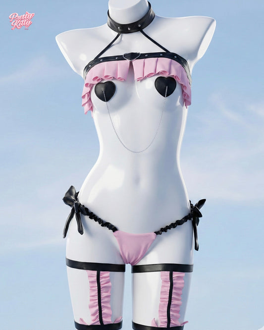 Front view of the pink and black Love Lock tactical set featuring heart pasties and body chains.