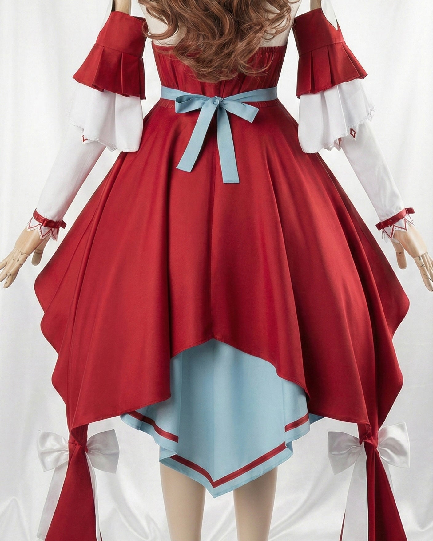 Back view of Still in Love racing uniform showing the blue waist bow and layered red skirt.